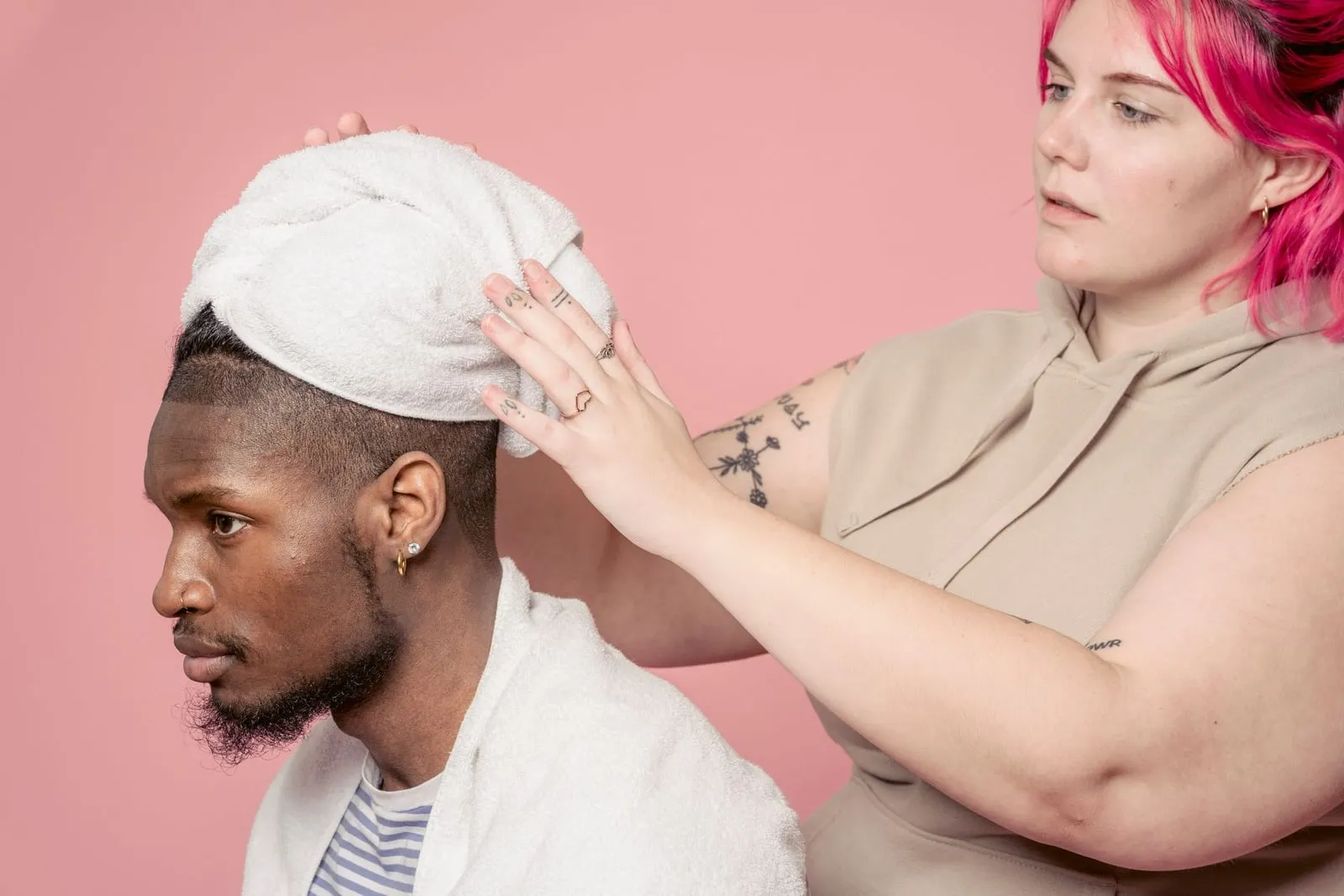 Hair being wrapped into a soft towel on top of the head