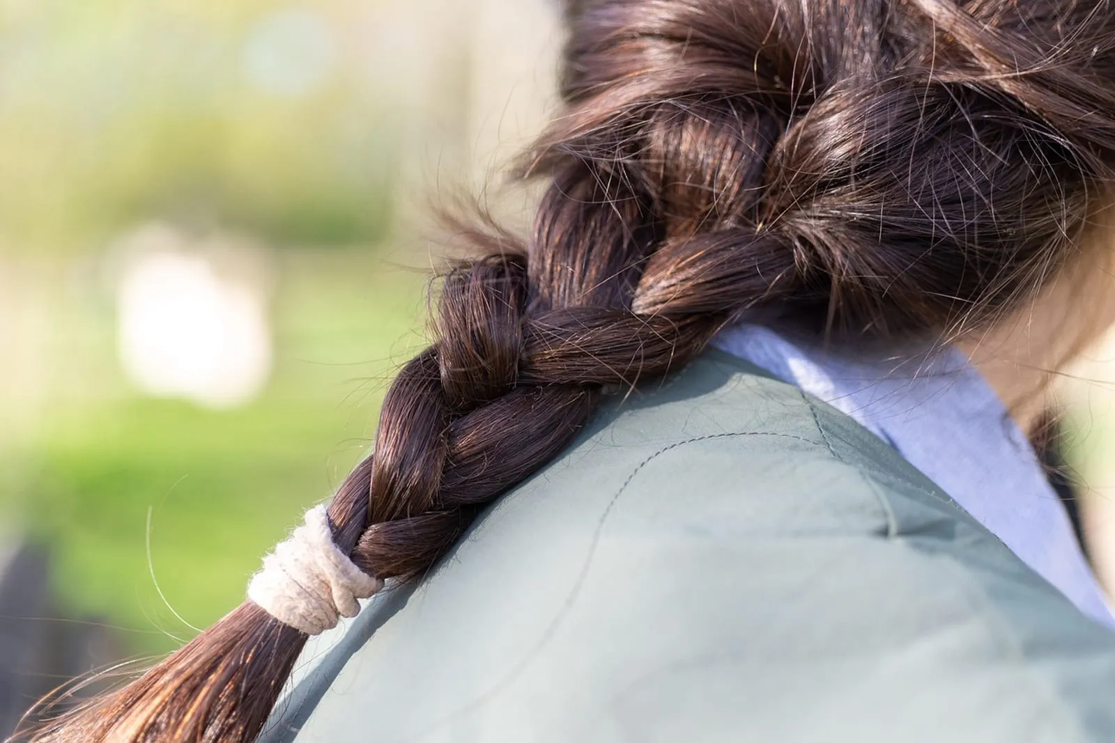 Woman with a loose side braid in her hair